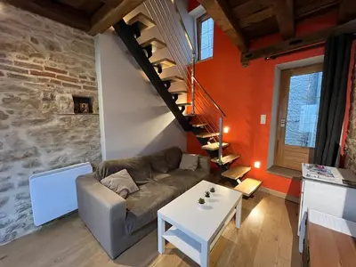 Coin salon dans l'établissement Au cœur de Paray- Quartier historique