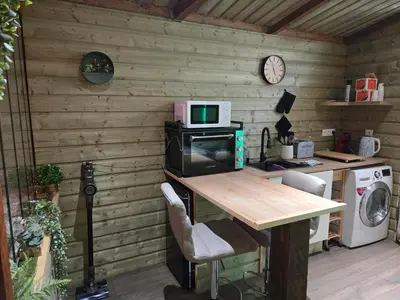 Cuisine ou kitchenette dans l'établissement Le chalet de vénus