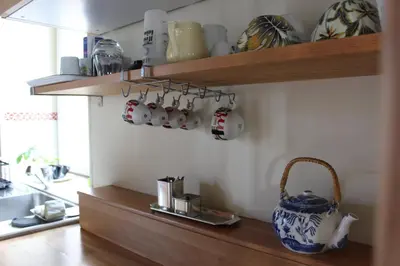 Cuisine ou kitchenette dans l'établissement Groovy Room - Gîte les Zazous