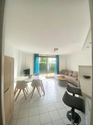 Coin salon dans l'établissement Appartement résidence piscine - Dijon quartier Toison d'Or