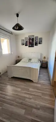 Un ou plusieurs lits dans un hébergement de l'établissement Appartement Duplex