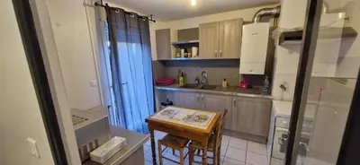 Cuisine ou kitchenette dans l'établissement Appartement Duplex