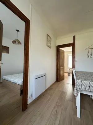 Un ou plusieurs lits dans un hébergement de l'établissement L'Appartement Assas