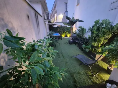 Jardin de l'établissement Studio avec Spa Privatif & Terrasse Jungle Dijon Centre