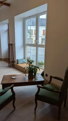Coin salon dans l'établissement Auberge de la Belette Cendrée