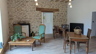 Coin salon dans l'établissement Auberge de la Belette Cendrée