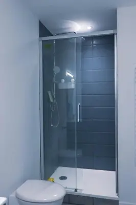 Salle de bains dans l'établissement Appart'HomeStudio Mâcon - PARKING