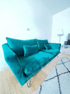 Coin salon dans l'établissement Le Philibert - 50m2, 4 Prs, 2 Ch - proche gare