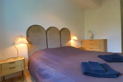 Un ou plusieurs lits dans un hébergement de l'établissement Domaine en bord de saone