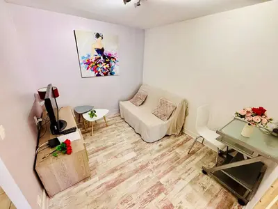 Coin salon dans l'établissement Le cosy - T2 52m2 - Proche Gare TGV et RCEA