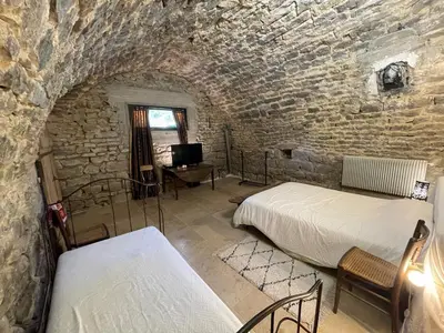 Un ou plusieurs lits dans un hébergement de l'établissement Vacances dans le Jura