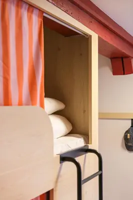Un ou plusieurs lits dans un hébergement de l'établissement Mustard Hostel