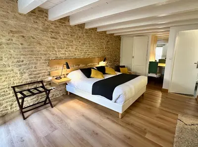 Un ou plusieurs lits dans un hébergement de l'établissement Clos de Fougères - La Grange 6-7 personnes