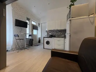 Cuisine ou kitchenette dans l'établissement Studio en résidence