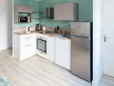 Cuisine ou kitchenette dans l'établissement Chaleureux et raffiné centre -ville Mâcon