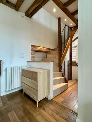 Un ou plusieurs lits dans un hébergement de l'établissement Maison cosy à côté de Beaune