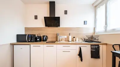 Cuisine ou kitchenette dans l'établissement BALNEO - SAUNA - WIFi - LA CLÉ DU DÉSIR