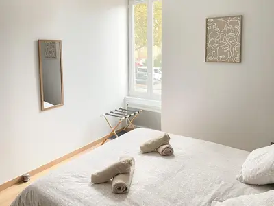 Un ou plusieurs lits dans un hébergement de l'établissement Cocon design centre ville proche gare