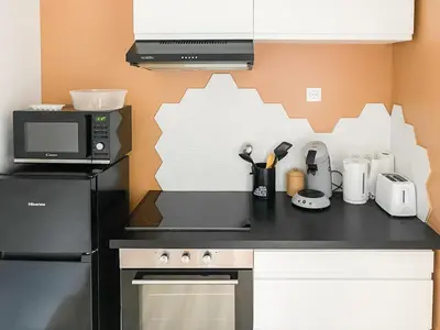 Cuisine ou kitchenette dans l'établissement Cocon design centre ville proche gare