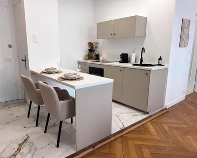 Cuisine ou kitchenette dans l'établissement La Suite Asmée - Centre-ville Lons-le-Saunier