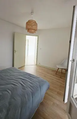 Un ou plusieurs lits dans un hébergement de l'établissement Cozy house in downtown Dole