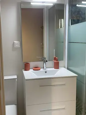 Salle de bains dans l'établissement L'arrêt du pont