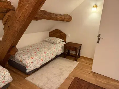 Un ou plusieurs lits dans un hébergement de l'établissement Auberge du Vieux Brancion