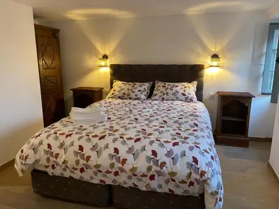 Un ou plusieurs lits dans un hébergement de l'établissement Auberge du Vieux Brancion