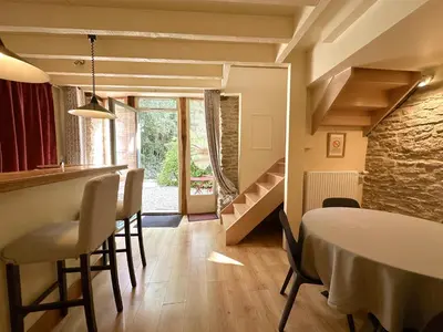 Coin salon dans l'établissement Clos de Fougères - Duplex Les Fleurières