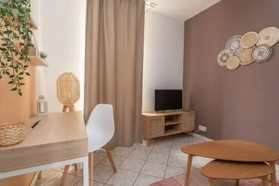 Télévision ou salle de divertissement dans l'établissement Appartement proche gare