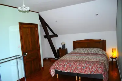 Un ou plusieurs lits dans un hébergement de l'établissement La maison de l etang