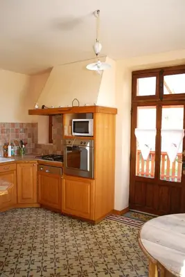 Cuisine ou kitchenette dans l'établissement La maison de l etang