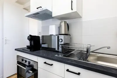 Cuisine ou kitchenette dans l'établissement Le Nido - stationnement privé gratuit