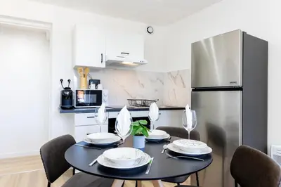 Cuisine ou kitchenette dans l'établissement Le Cocon - parking privé