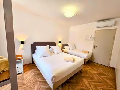 Un ou plusieurs lits dans un hébergement de l'établissement L'appartement 3 by Vindihouses
