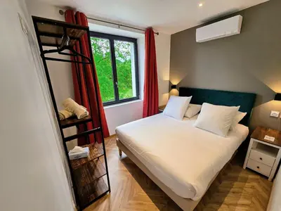 Un ou plusieurs lits dans un hébergement de l'établissement L'appartement 6 by Vindihouses