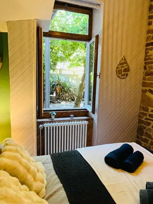 Un ou plusieurs lits dans un hébergement de l'établissement Le Clos du Chaignot - Homillesime