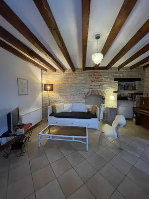 Coin salon dans l'établissement Beautiful 70 m2 village house