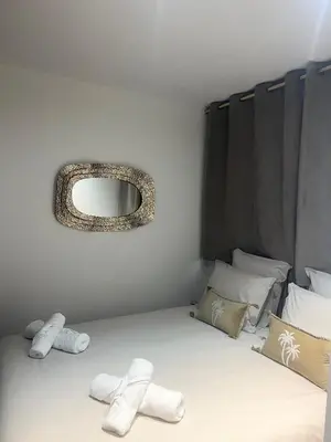 Un ou plusieurs lits dans un hébergement de l'établissement Les Nuits en Grands Crus Appartement cosy, près de Beaune, au cœur des vignes