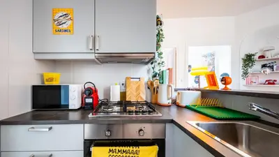 Cuisine ou kitchenette dans l'établissement Loft Coloré Dijon - À 2 pas du jardin Darcy