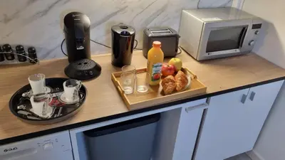 Cuisine ou kitchenette dans l'établissement De Manhattan à la savane