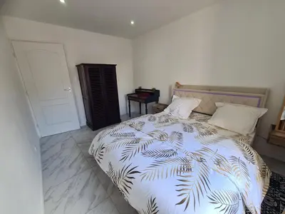 Un ou plusieurs lits dans un hébergement de l'établissement Rive gauche Rive droite Appartements Cosy très bien situés