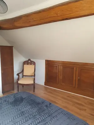 Un ou plusieurs lits dans un hébergement de l'établissement Maison de campagne