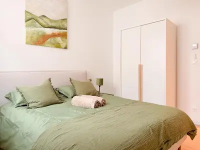 Un ou plusieurs lits dans un hébergement de l'établissement Maison Nova
