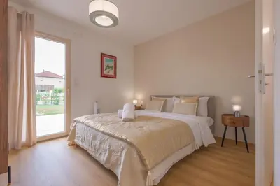 Un ou plusieurs lits dans un hébergement de l'établissement Villa au coeur de Mézériat