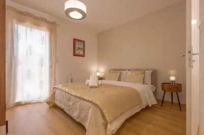 Un ou plusieurs lits dans un hébergement de l'établissement Villa au coeur de Mézériat