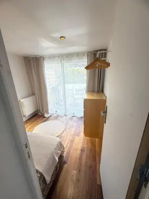 Un ou plusieurs lits dans un hébergement de l'établissement Appart cocooning terrasse