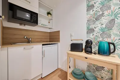 Cuisine ou kitchenette dans l'établissement Les tuiles bourguignonnes