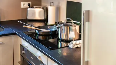 Cuisine ou kitchenette dans l'établissement Appart Confort Max 6 Personnes Parking Gratuit
