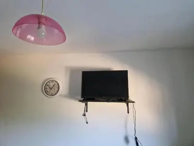 Télévision ou salle de divertissement dans l'établissement Studio confortable avec vue sur la ville à Dole, 25 m²